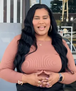 a living room filled with furniture and a fireplace