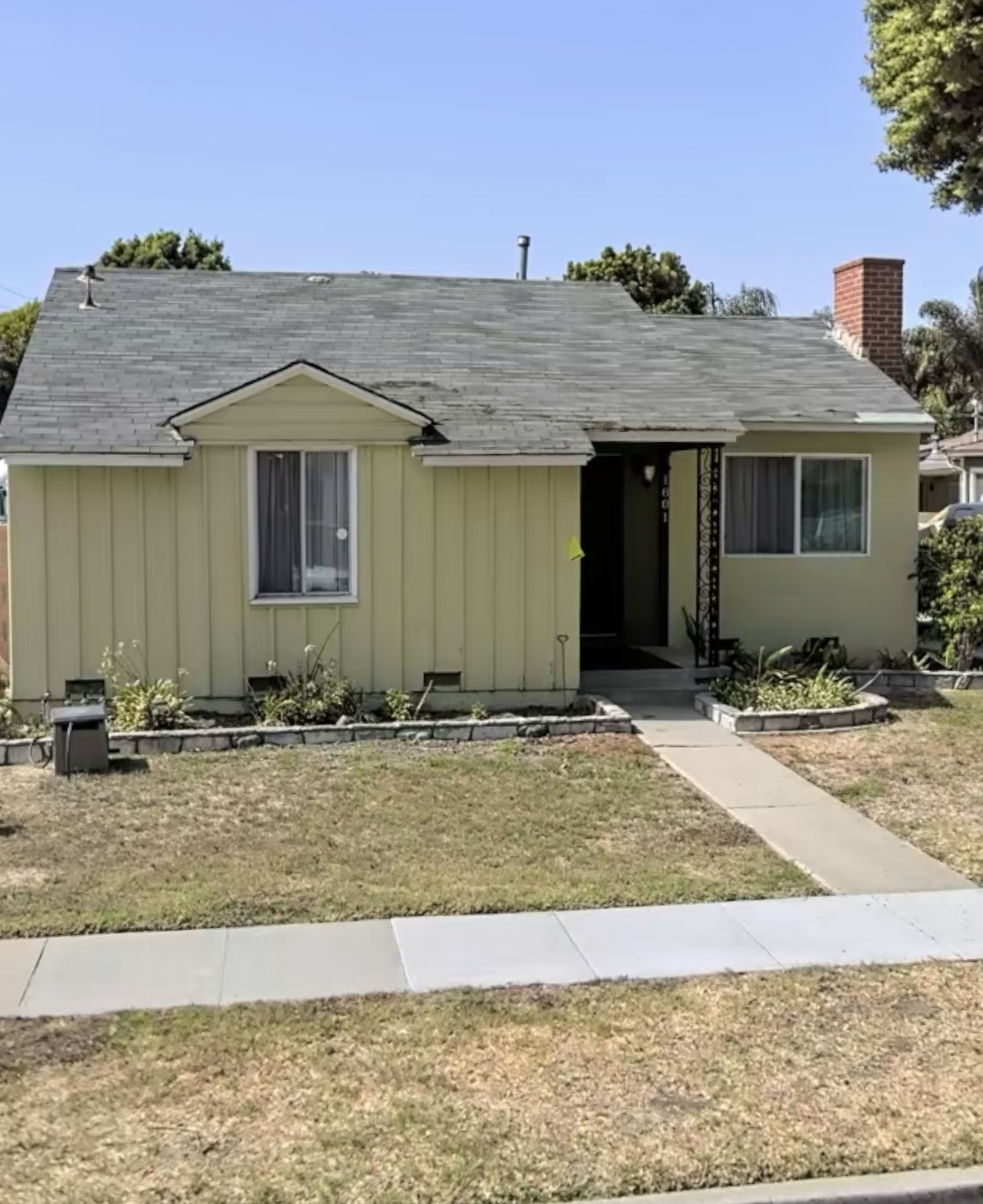 Older Long Beach home before renovation, illustrating a property buyers might overlook after sitting on the market