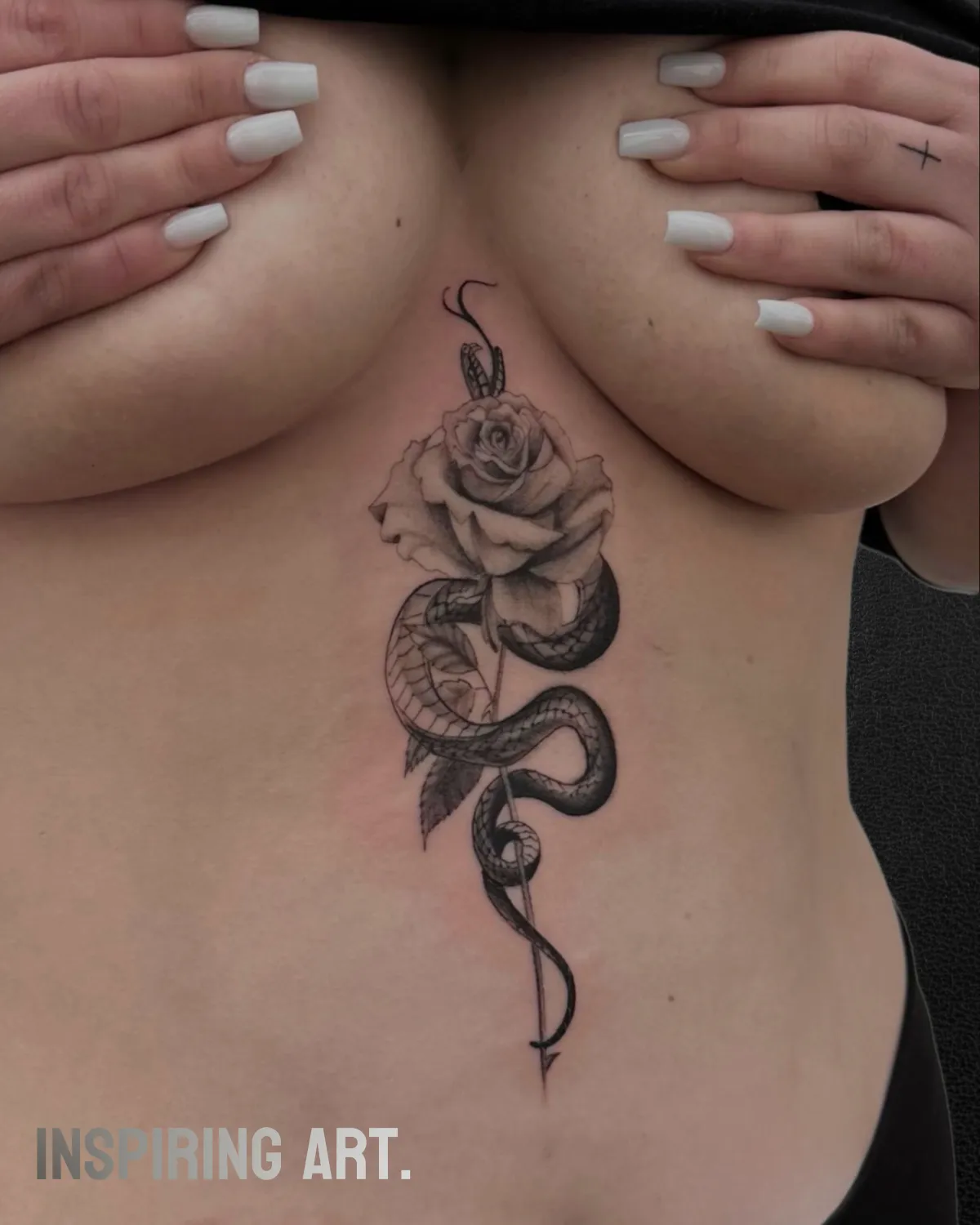 person with tattoo on right arm