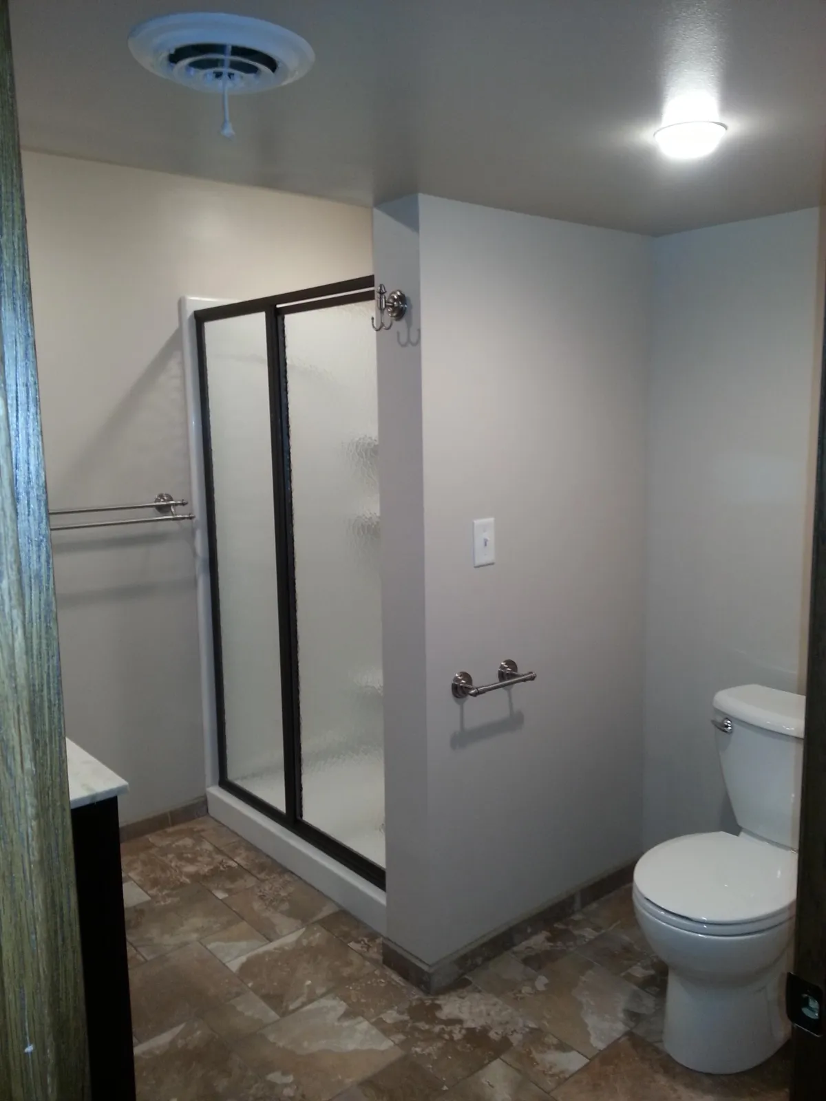 Bathroom remodel Loves Park IL with walk-in shower and tile