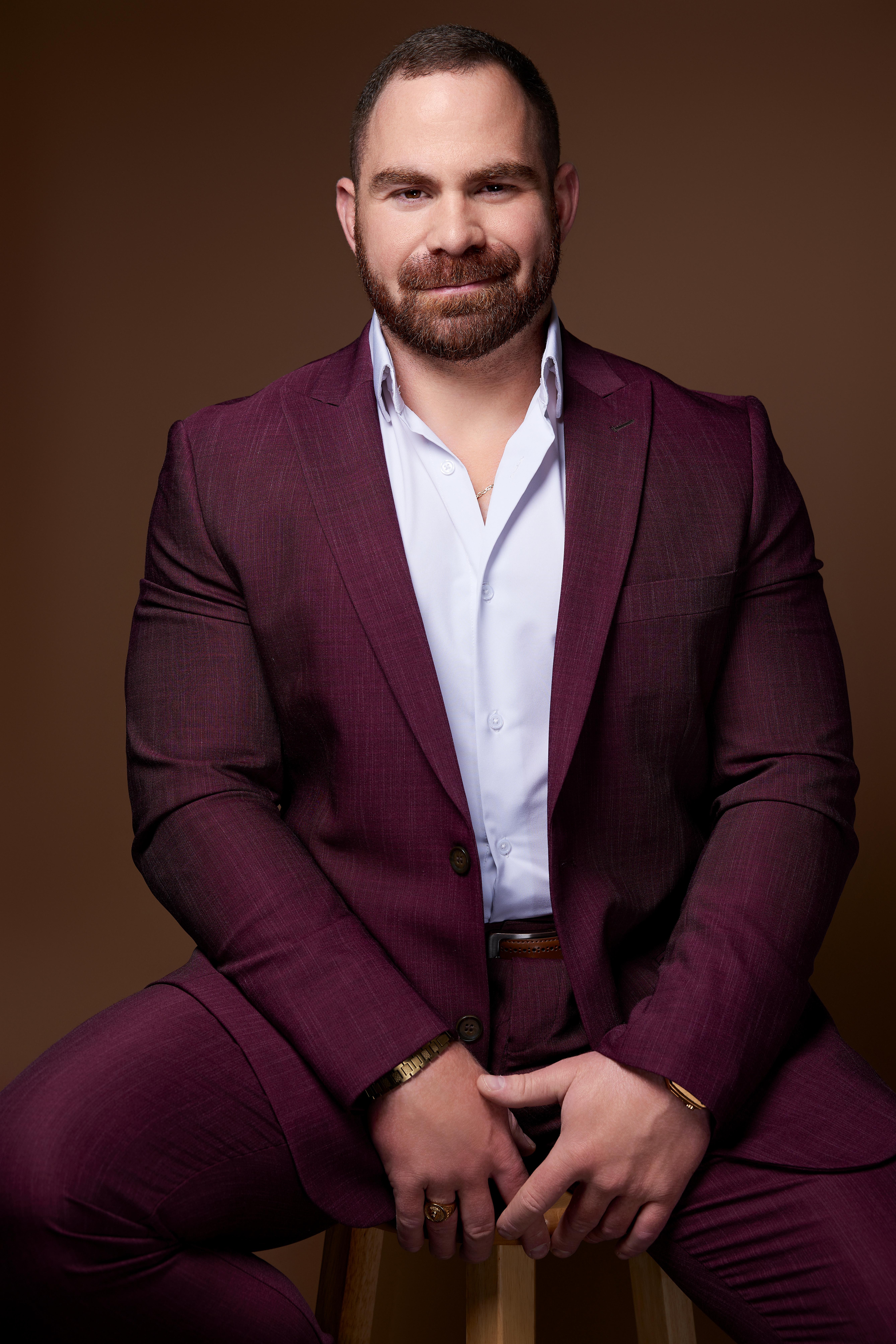 Portrait of a confident financial advisor in navy suit