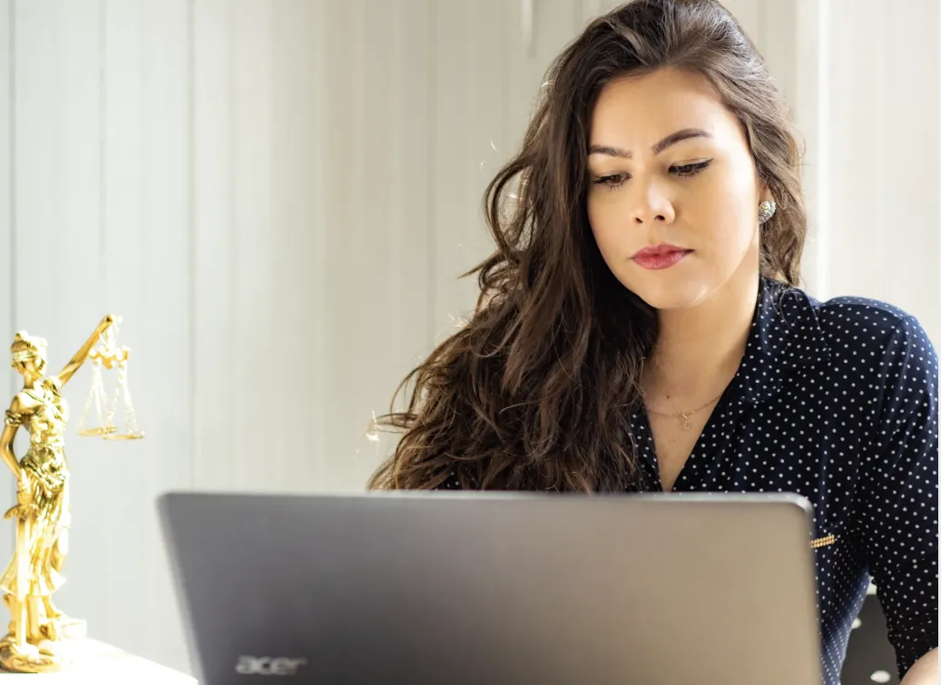 shallow focus photography of person holding camera lens