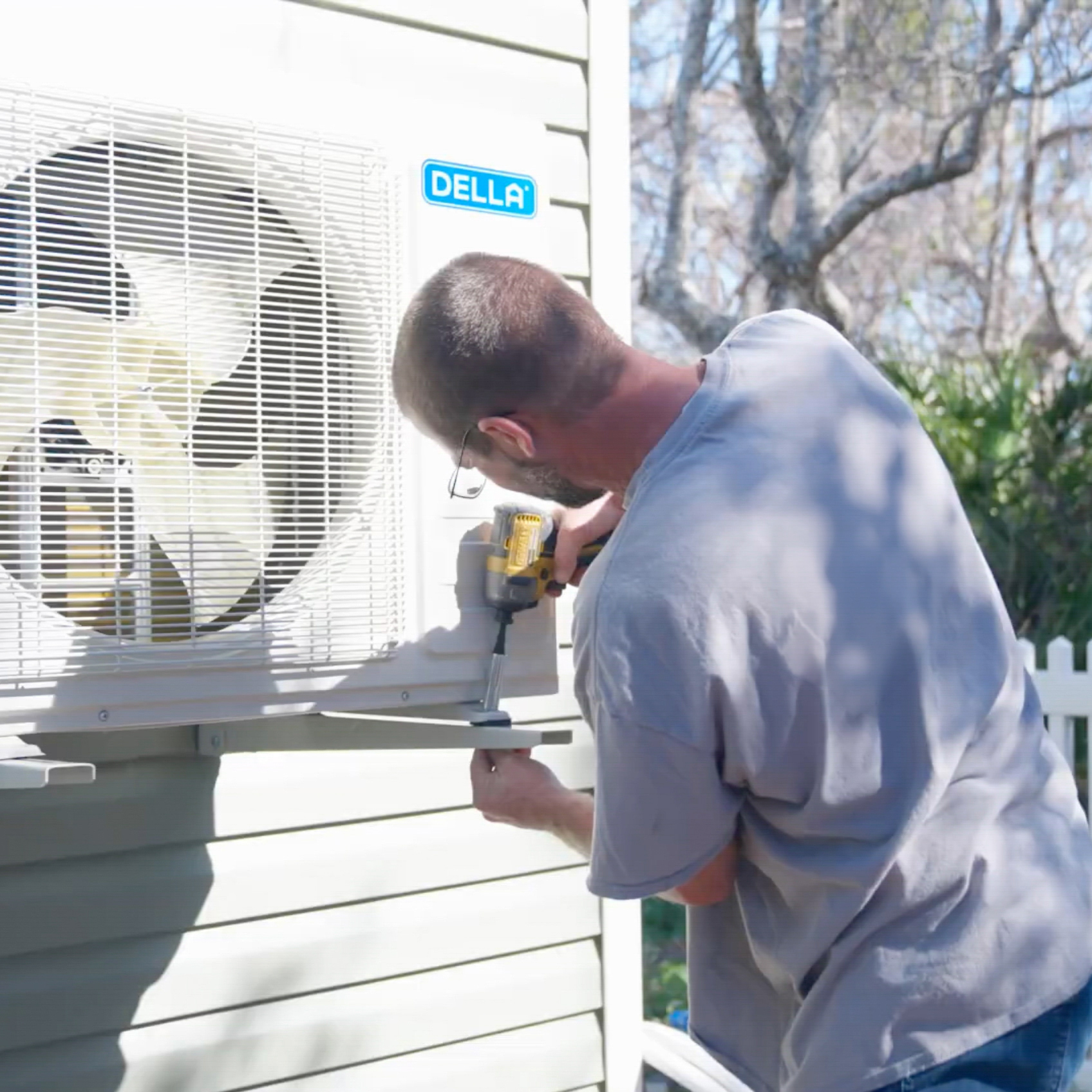 Outdoor air conditioning unit being inspected by HVAC technician in Safety Harbor