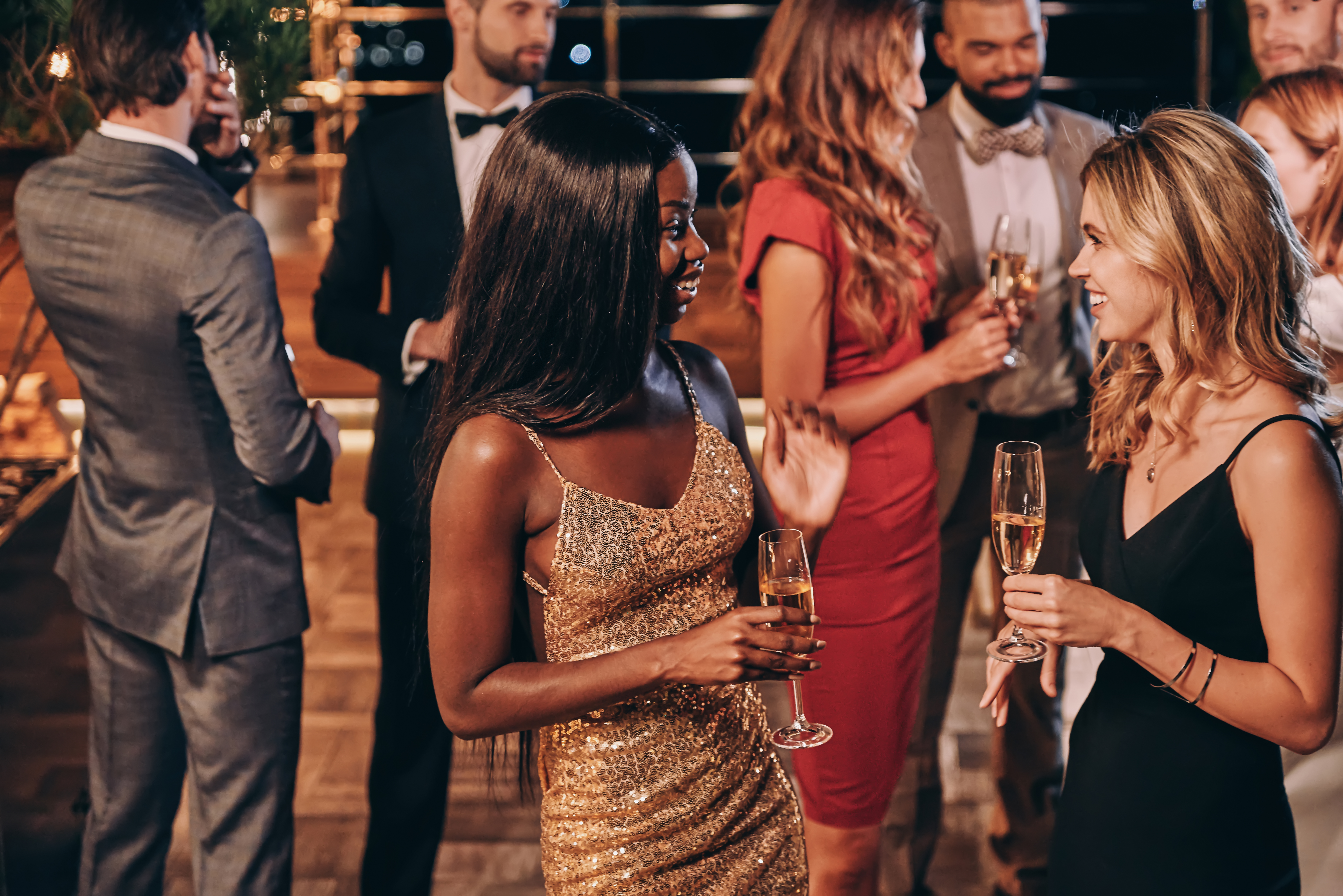 Elegantly dressed guests celebrating at an upscale private event in Southern Ontario