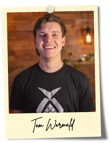 Photo of Tom Wormald wearing a black t-shirt at Island Recording Studios