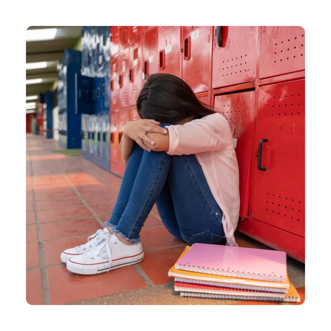 Child crying at school because bullied by friends