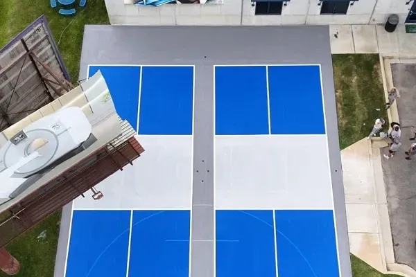 image of a two pickleball court arial view angle shot by drone for ace coatings