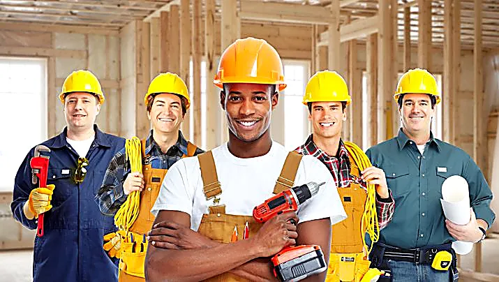 Contractor using a mobile phone to check web updates