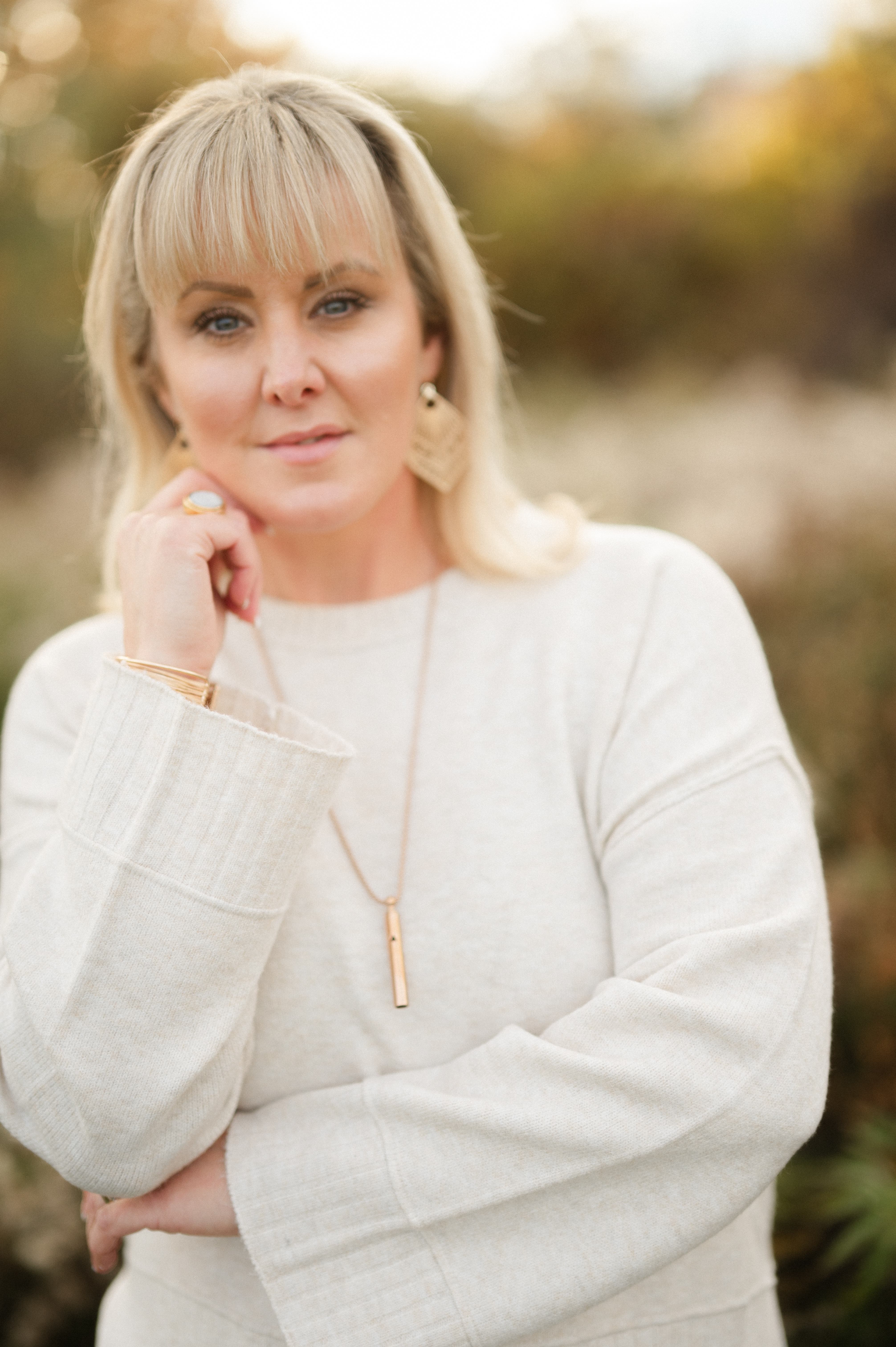 a man standing on a beach looking at the ocean