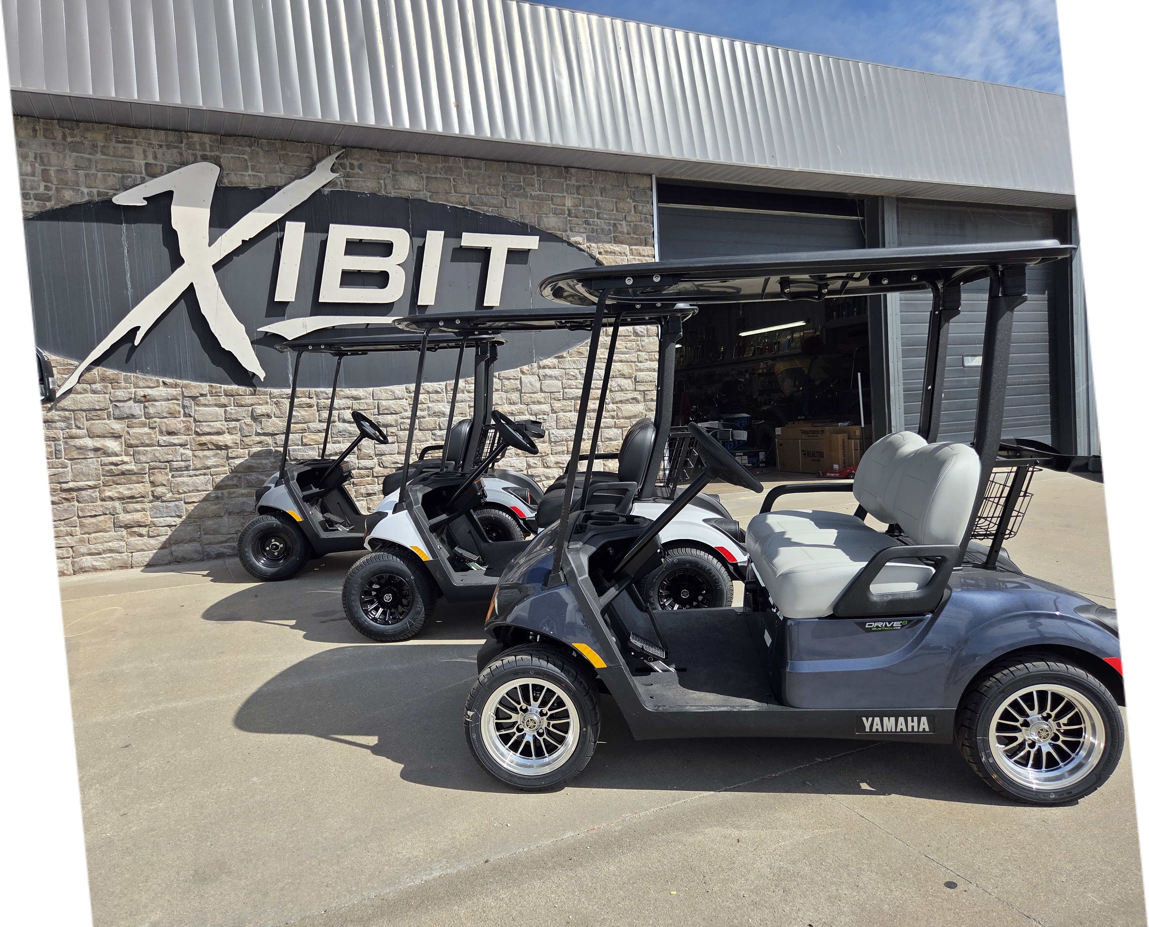 Aggressive off-road custom golf car build with rugged diamond plate texture and high-clearance lift