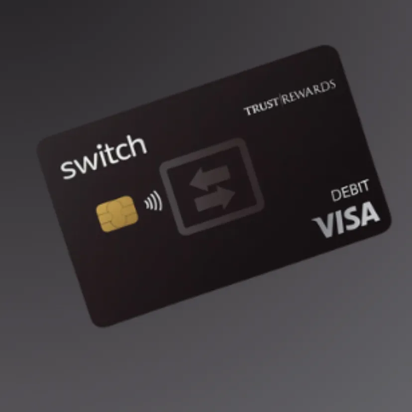 Person paying with a Switch card at a cafe counter