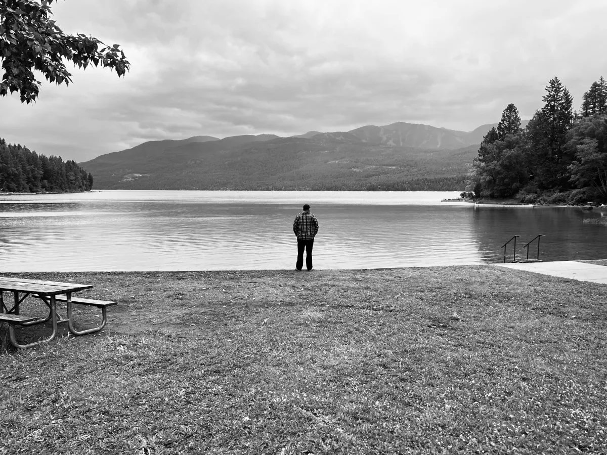 A panoramic view of San Francisco's skyline at sunrise, with the Golden Gate Bridge in the background and a bustling cityscape in the foreground, captured in crisp, modern style.