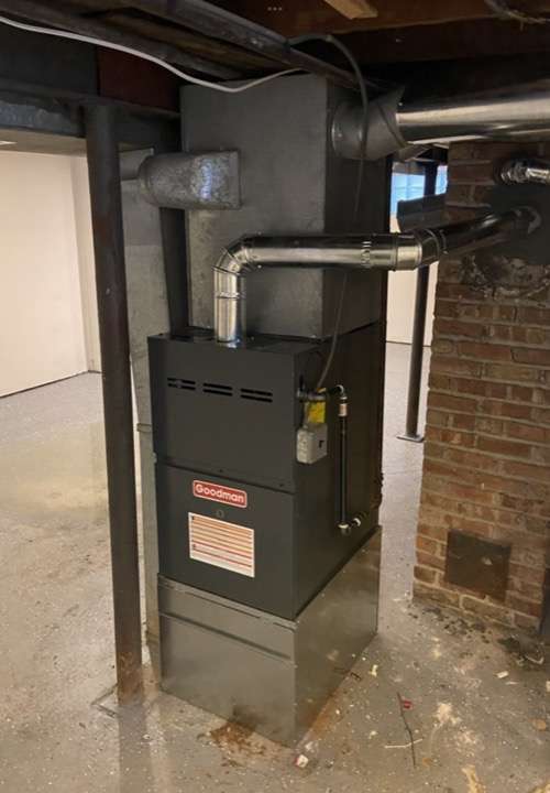 Completed furnace install with ductwork connections in a Chicago area home