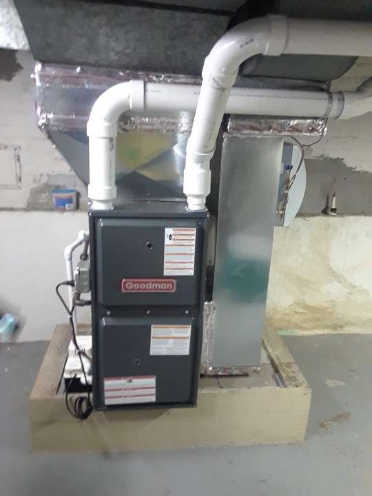 Furnace installation in a residential basement by Supreme Heating in Chicago