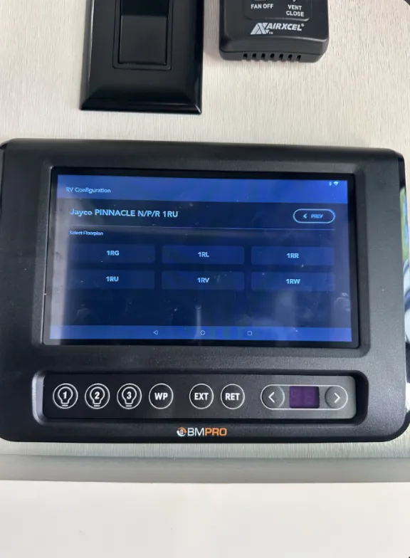 a painting of pink and green with blue and white dots