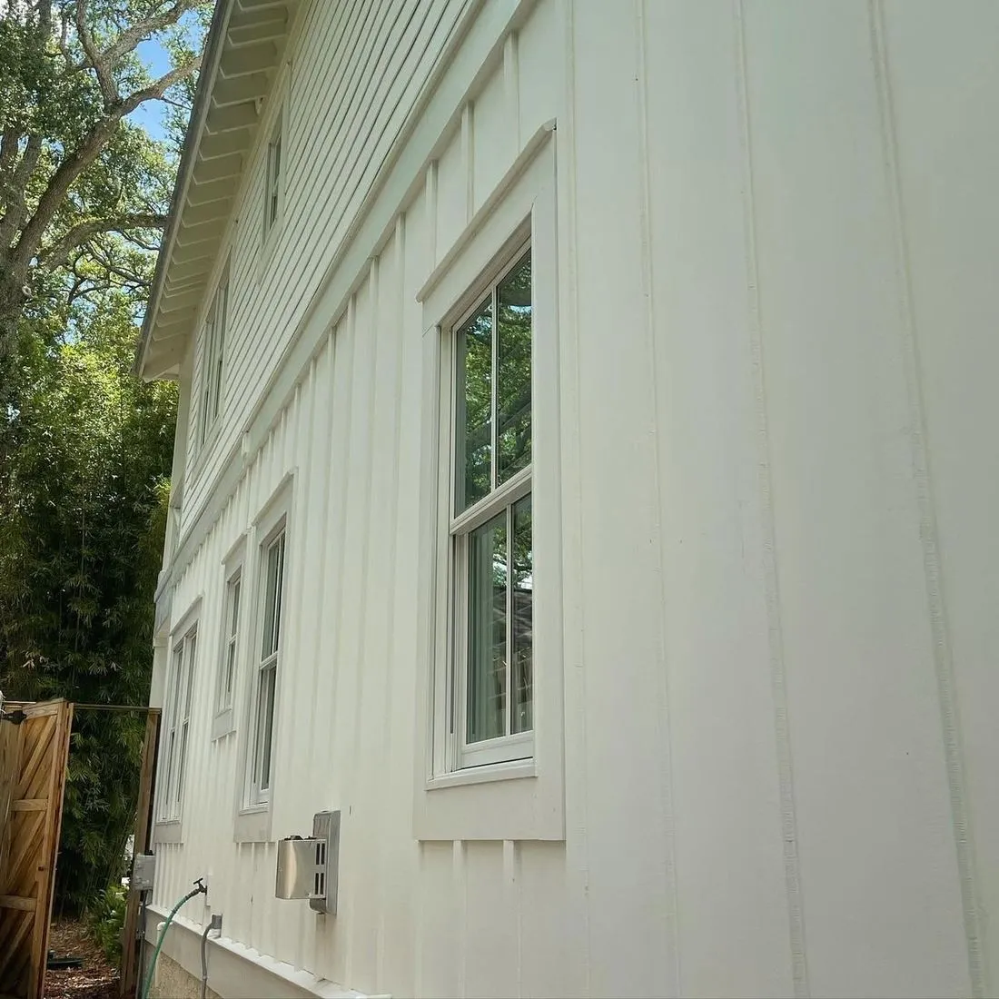 Board-and-batten siding after a soft wash by Atlantic Coastal Cleaning in Brunswick, GA