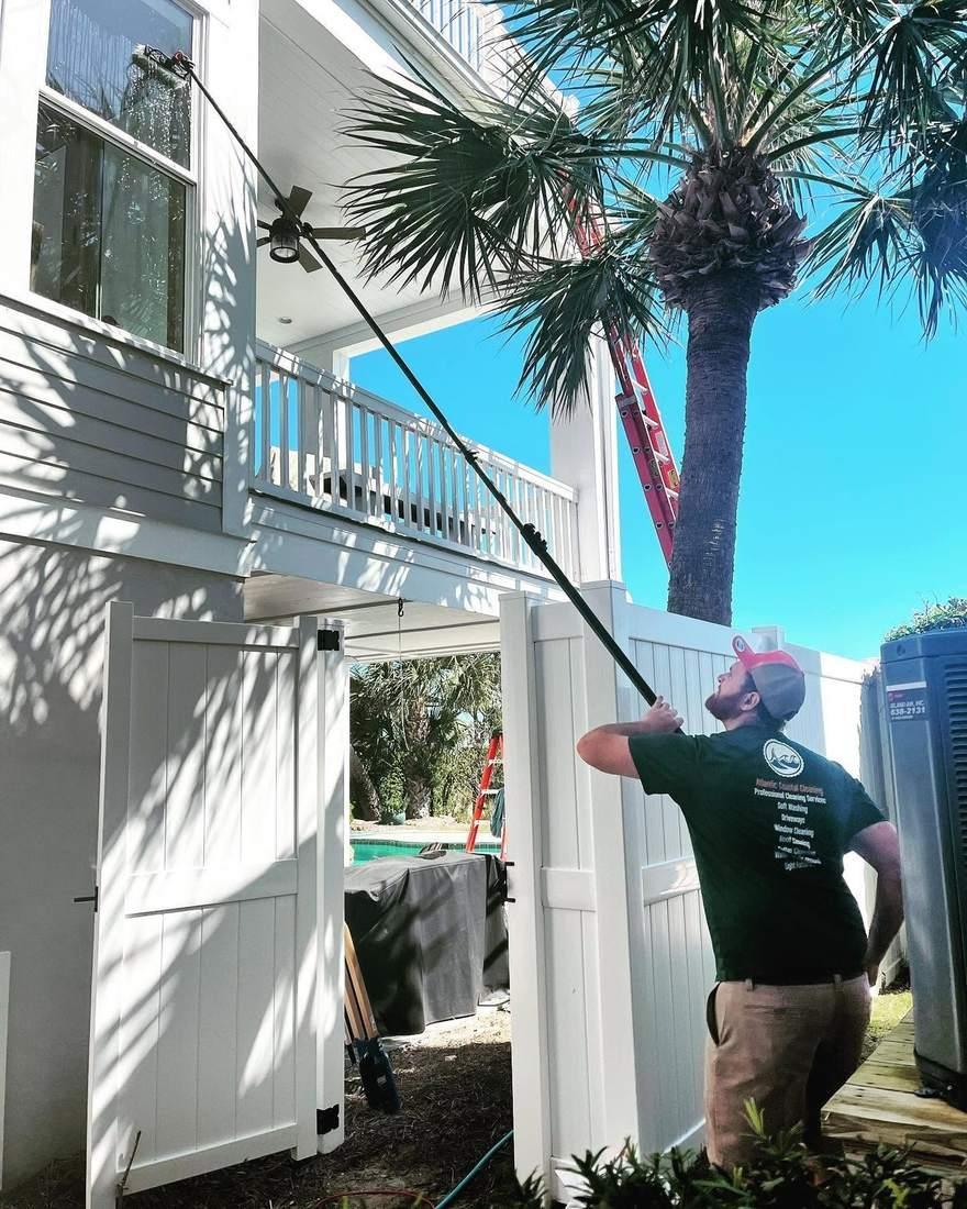 Window and light fixture cleaning on a two story home, St. Simons Island GA