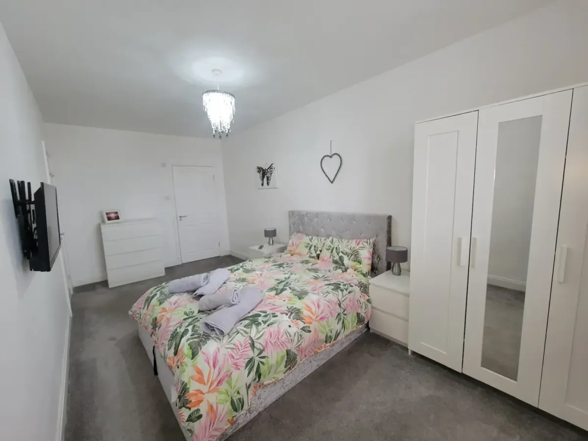 King size ensuite bedroom with smart tv