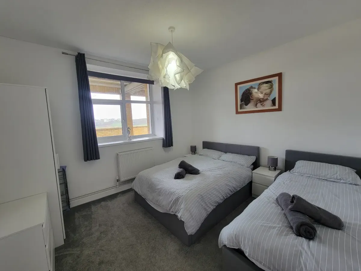 Tin bedroom with double and single bed
