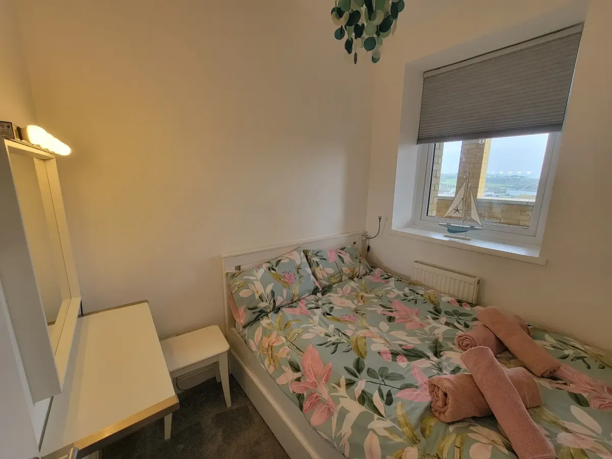 Cosy double bedroom with sunrise view
