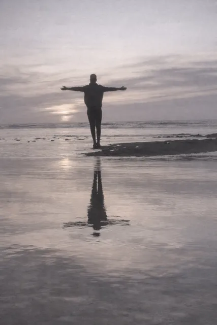 a group of people in a room with a projector screen