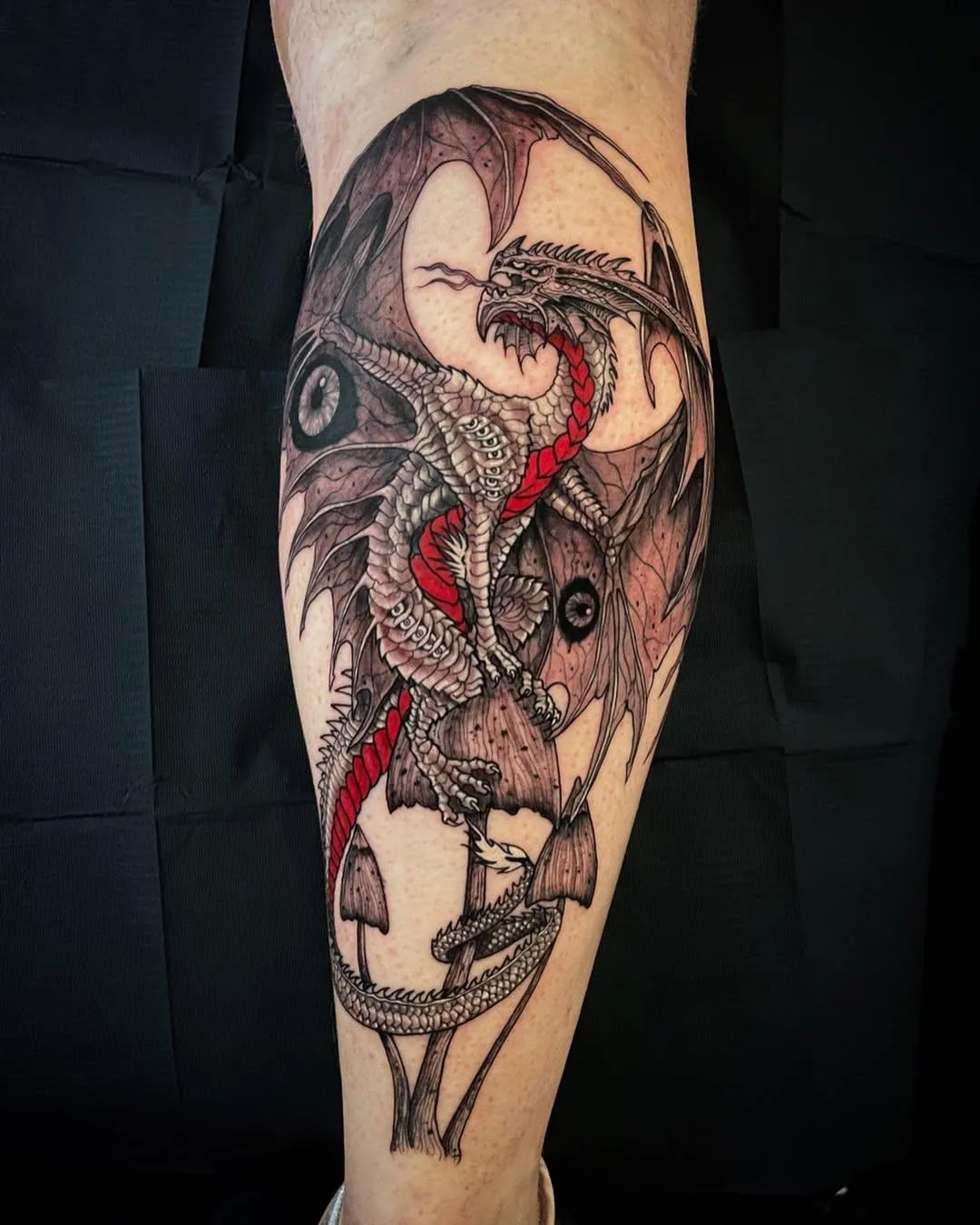 person with tattoo on right arm