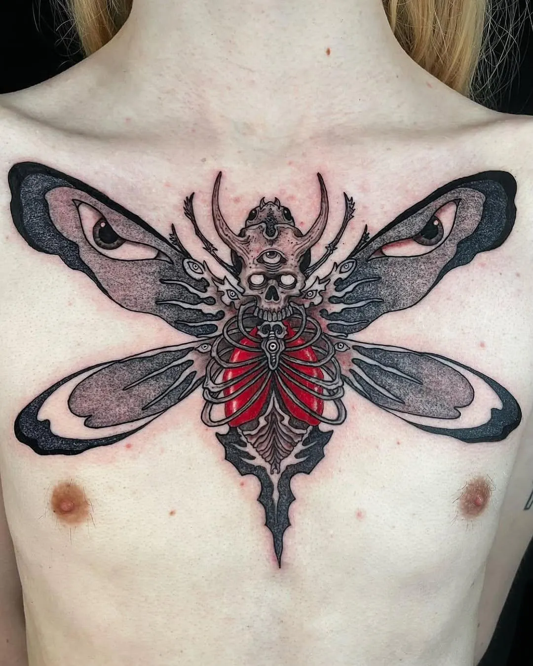 person in blue denim shorts and white nike sneakers standing on gray concrete floor