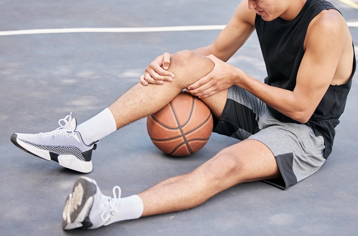 Basketball Player with Knee Injury in Fountain Valley