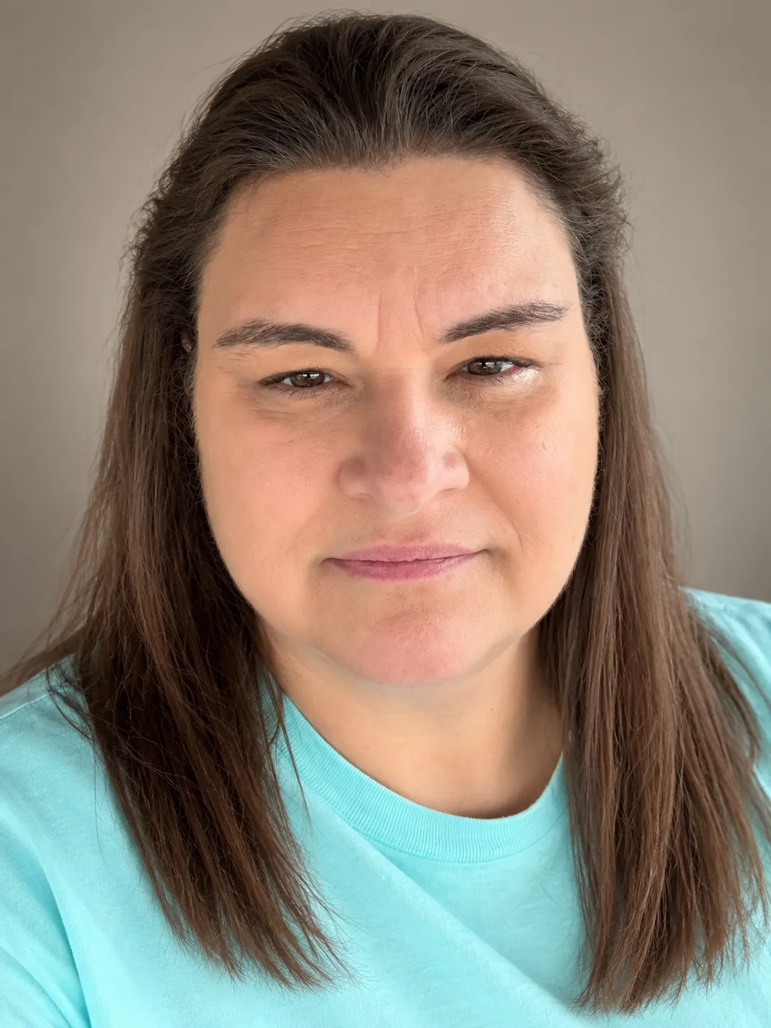 Warm portrait of Sarah Jenkins, Certified Nurse Midwife