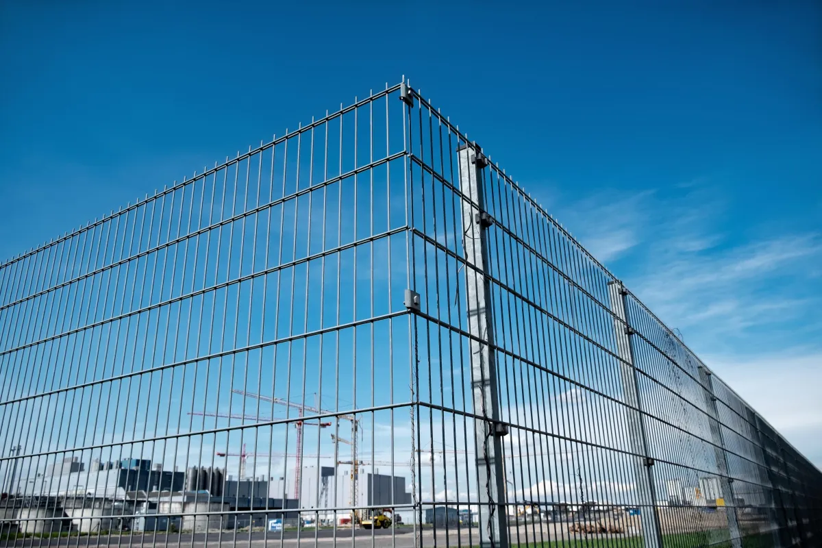blue and white metal fence