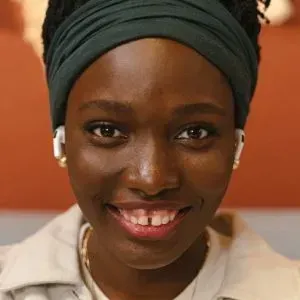 Smiling woman symbolizing strength, mental health support, and personal recovery.