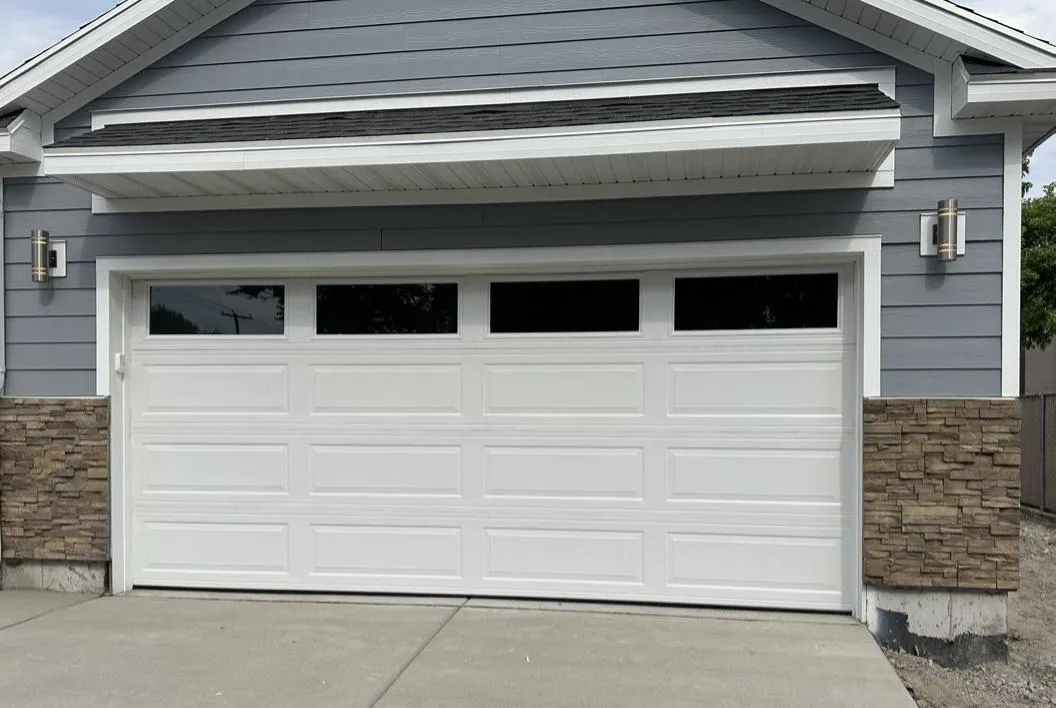 Newly installed residential garage door on a Hampton Roads home