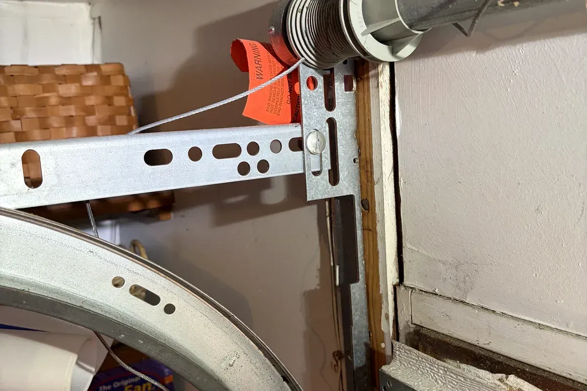 Garage door cable repair on a residential door in Hampton Roads