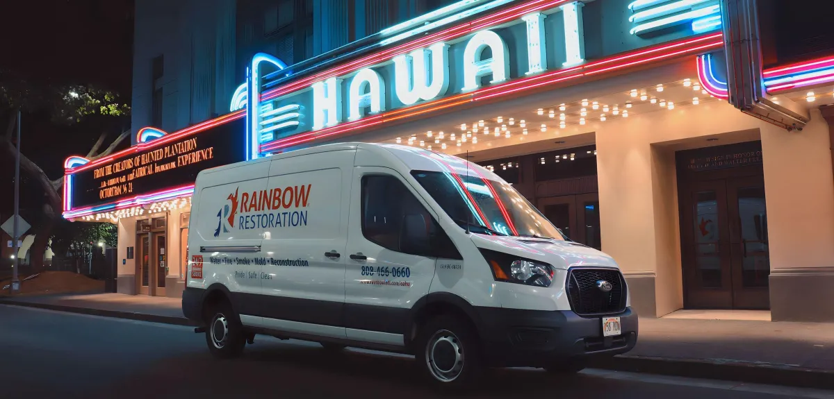 Water restoration service van in front of Hawaii sign - serving Oahu residents