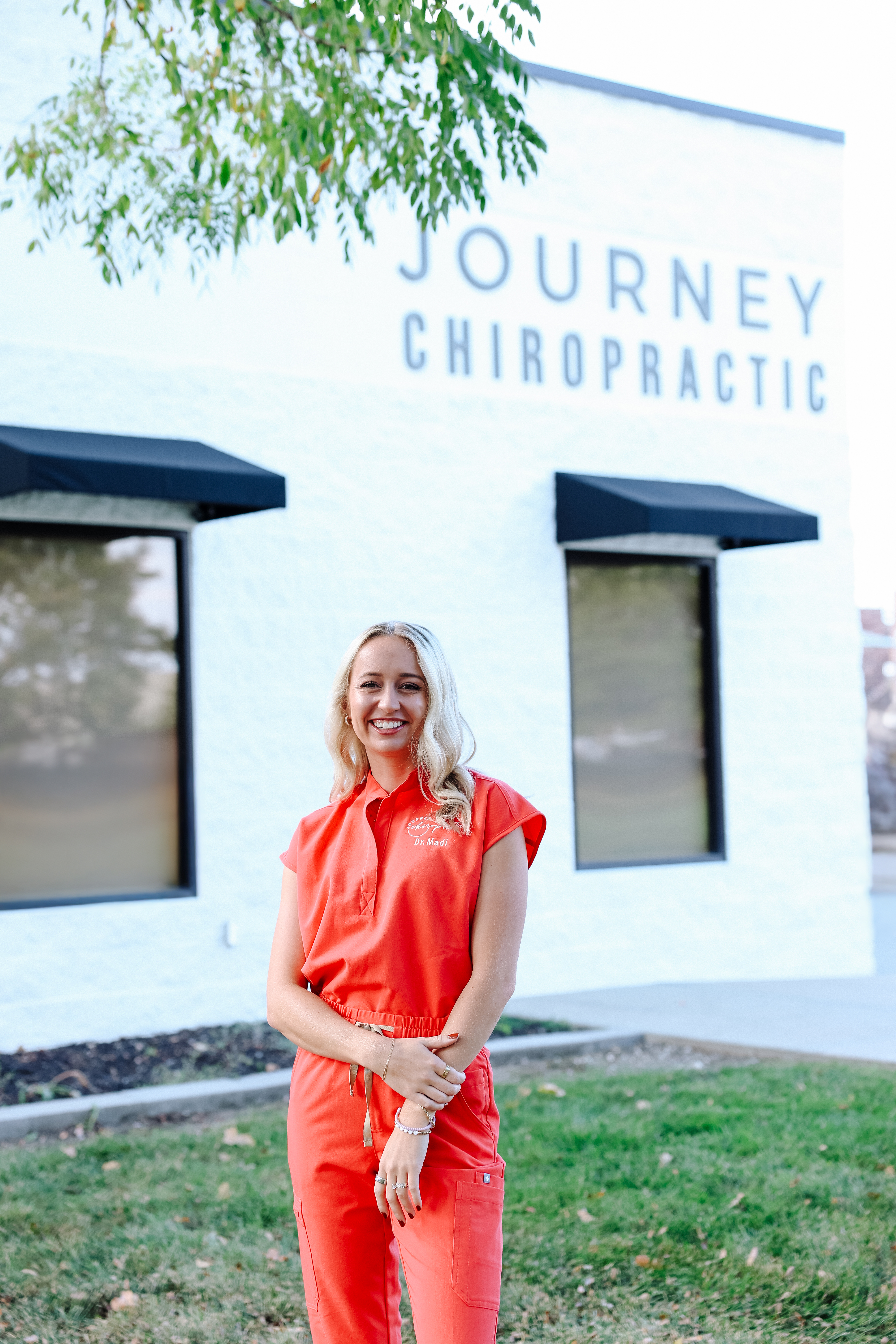 DR. MADI UHING-LARKEY, D.C.