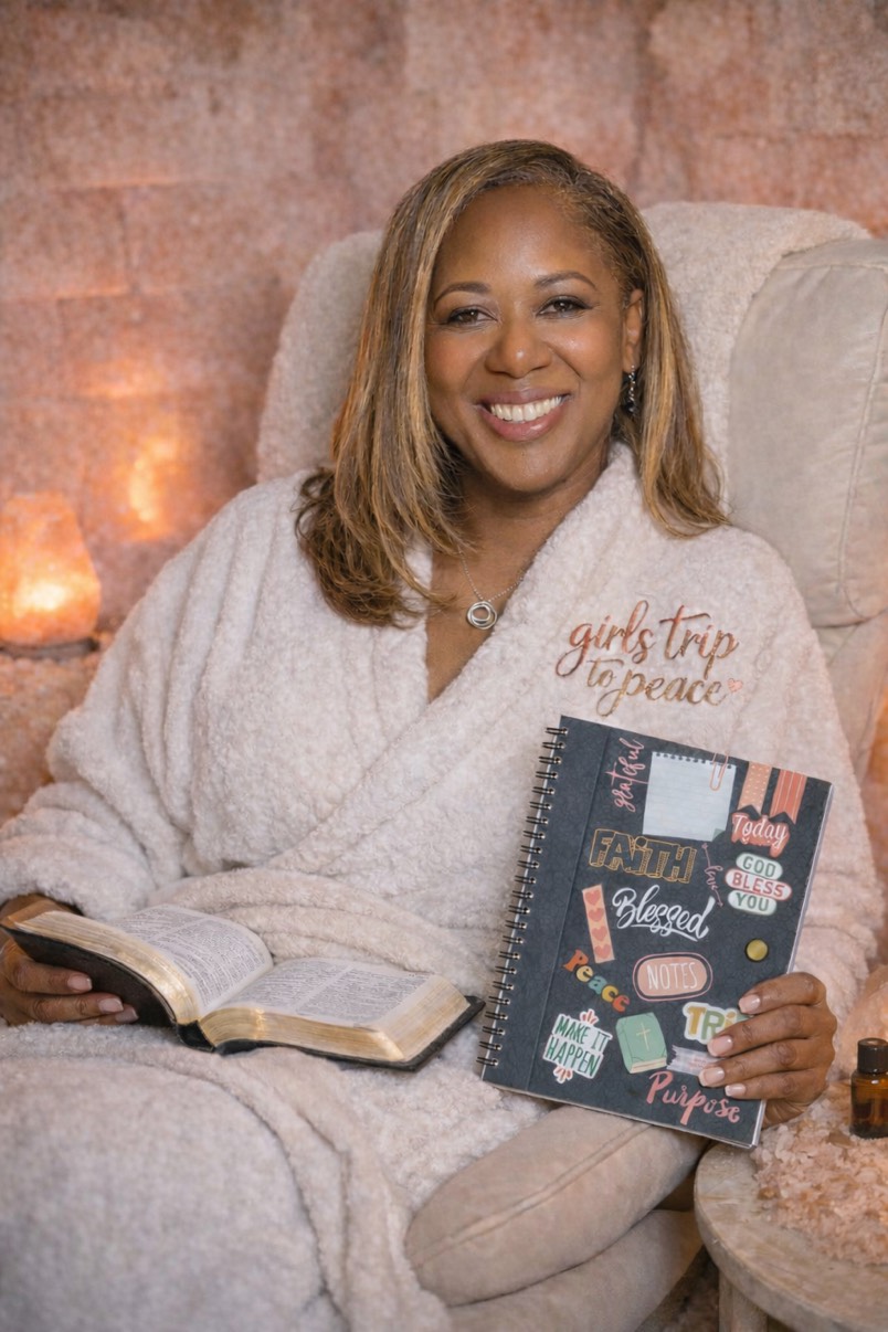 Woman looking at the ocean at sunset