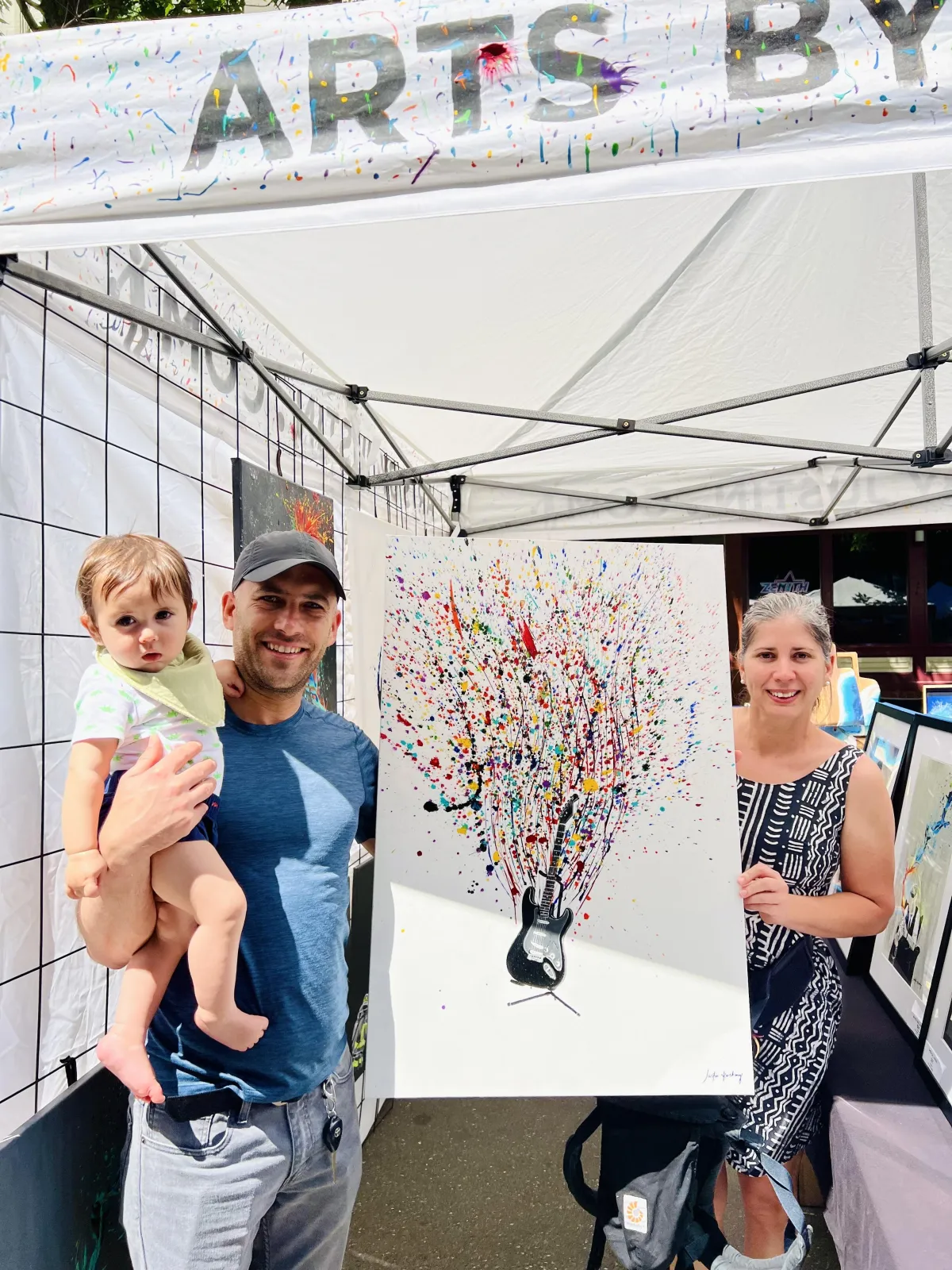 Customer together with her son and daughter Holding a resin epoxy art