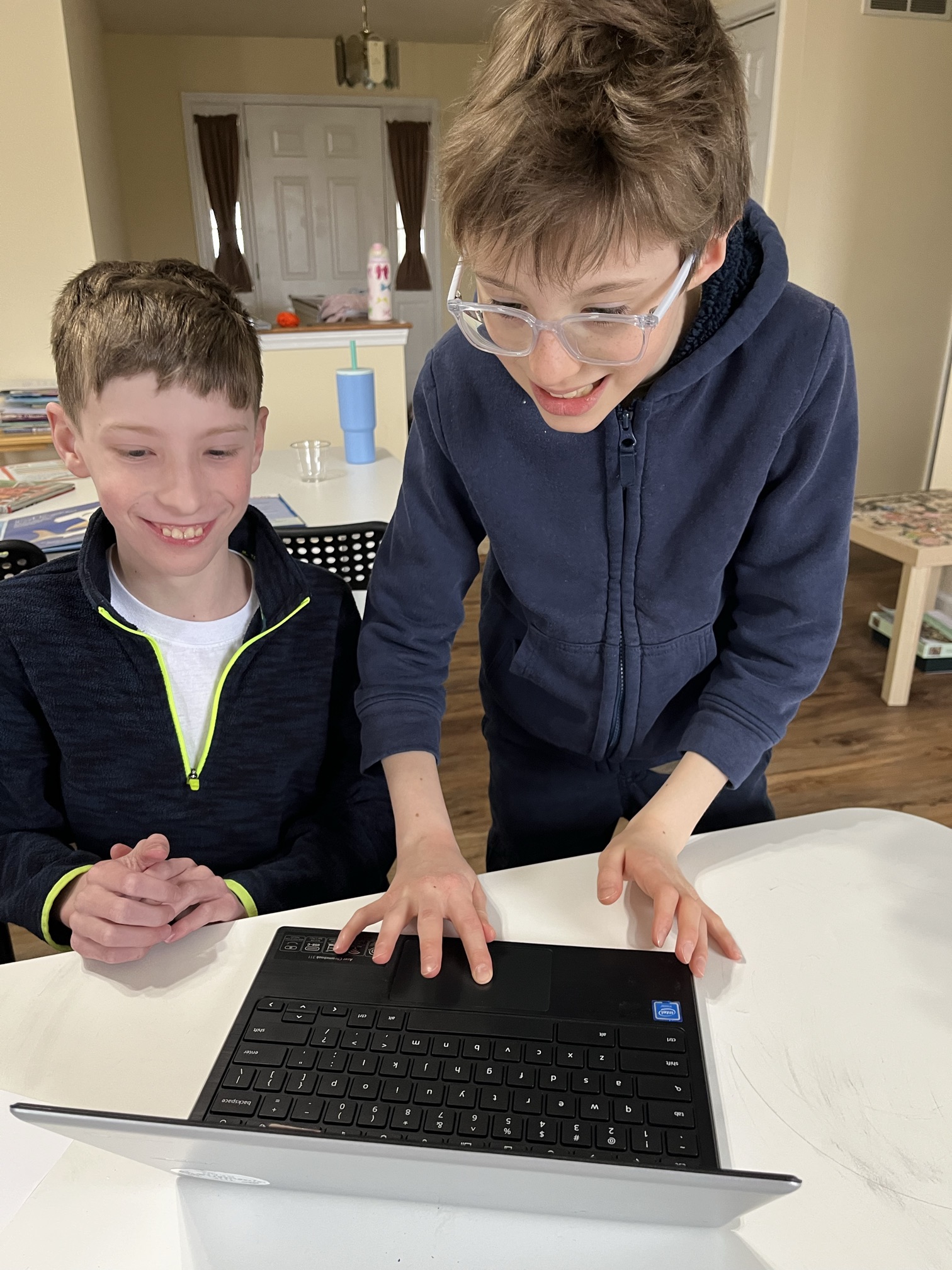 Professor and student conduct science experiment in lab