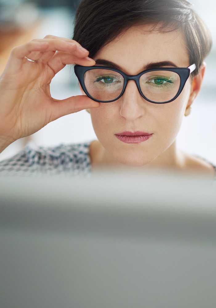 A wellness professional checking clear local visibility signals on a tablet