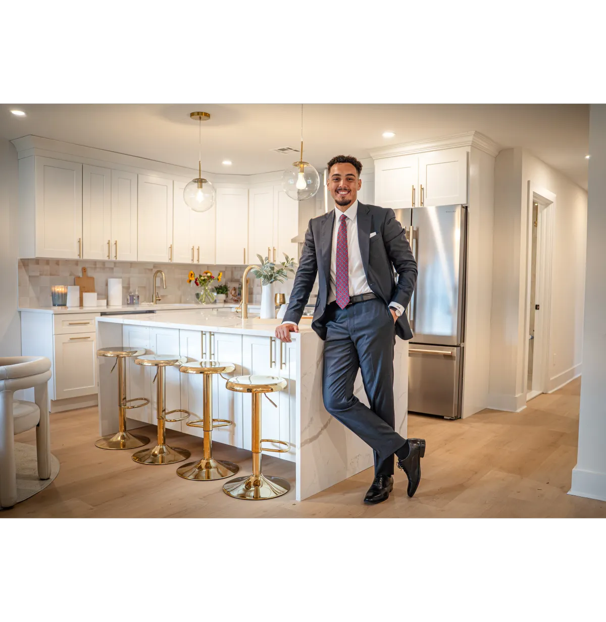 New Jersey real estate professional outside a residential property, helping homeowners sell their house with Meckey Estates.