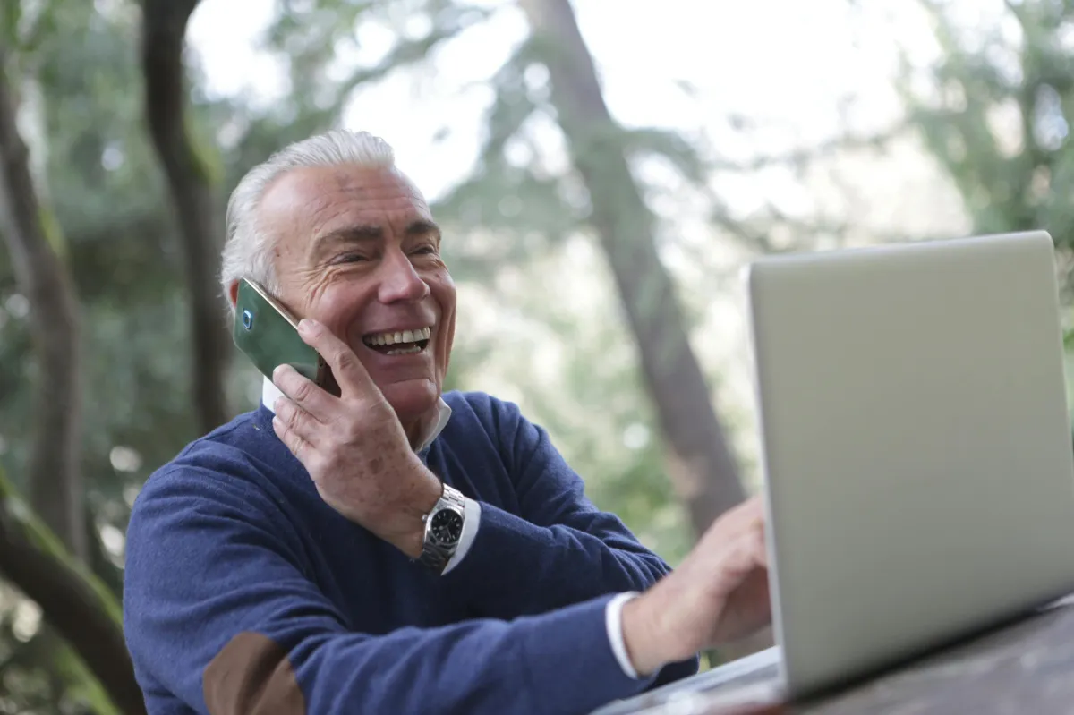 Older man smiling with All-On-6 full arch implants