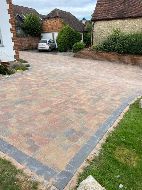 Block paved driveway at period stone and flint property in Buckinghamshire