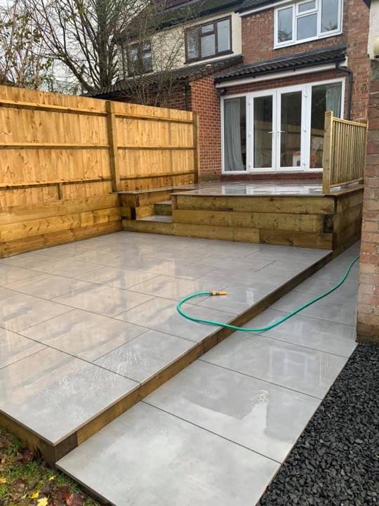 Porcelain patio with new fencing and raised timber step in Aylesbury area