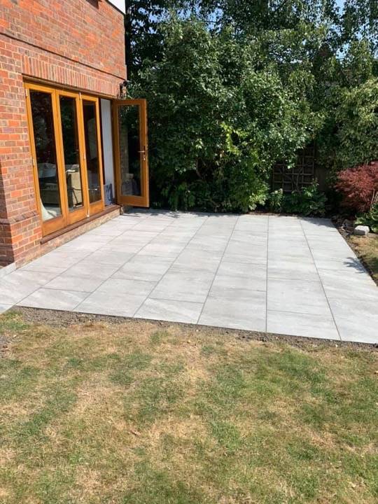 Light grey porcelain patio with bifold doors at property in Hemel Hempstead
