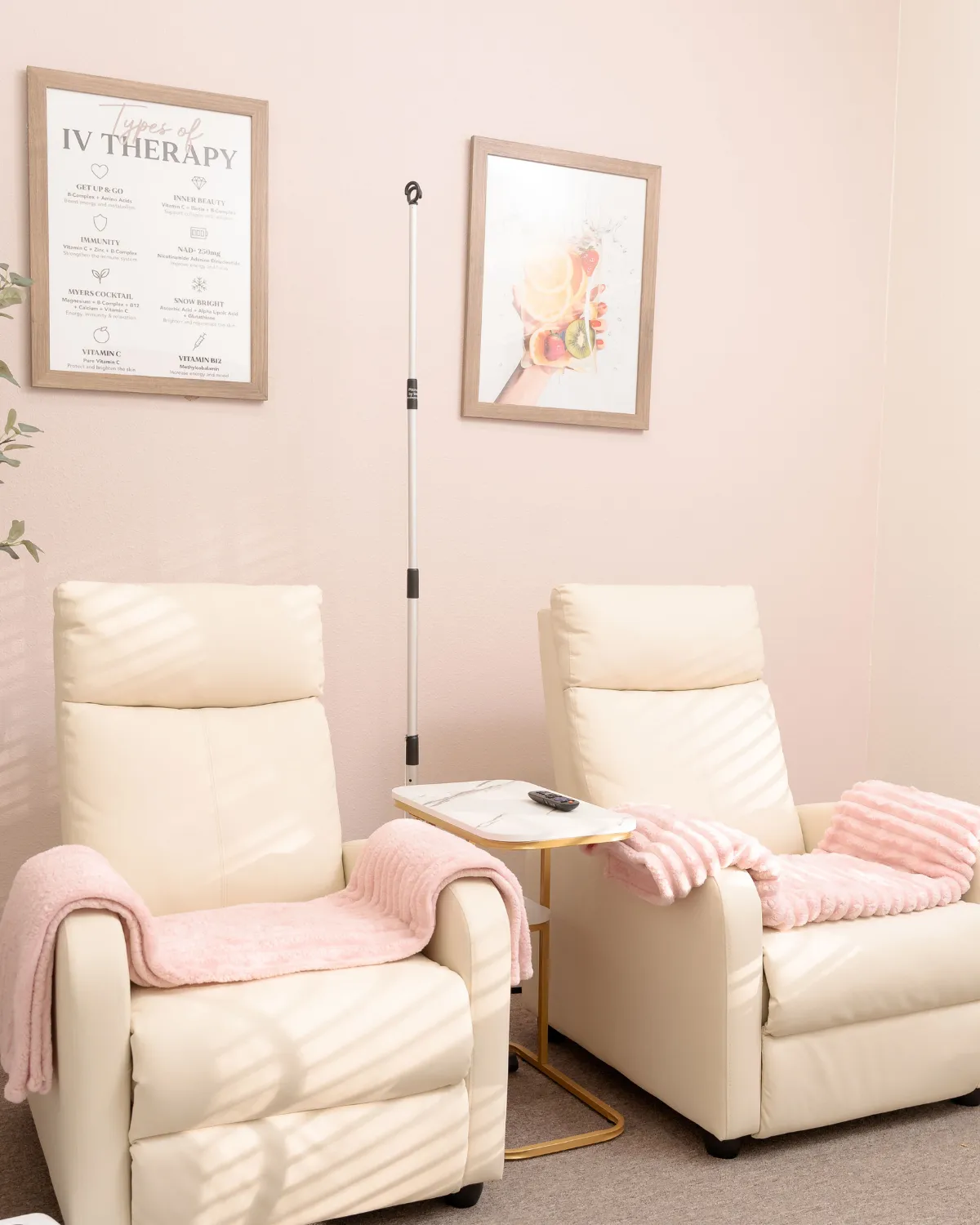 Barrel sauna with wood pile in grassy field.