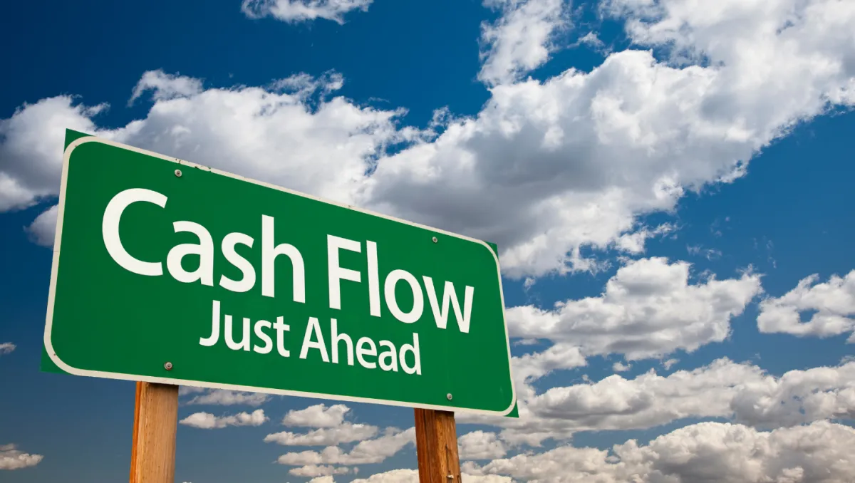 woman placing sticky notes on wall