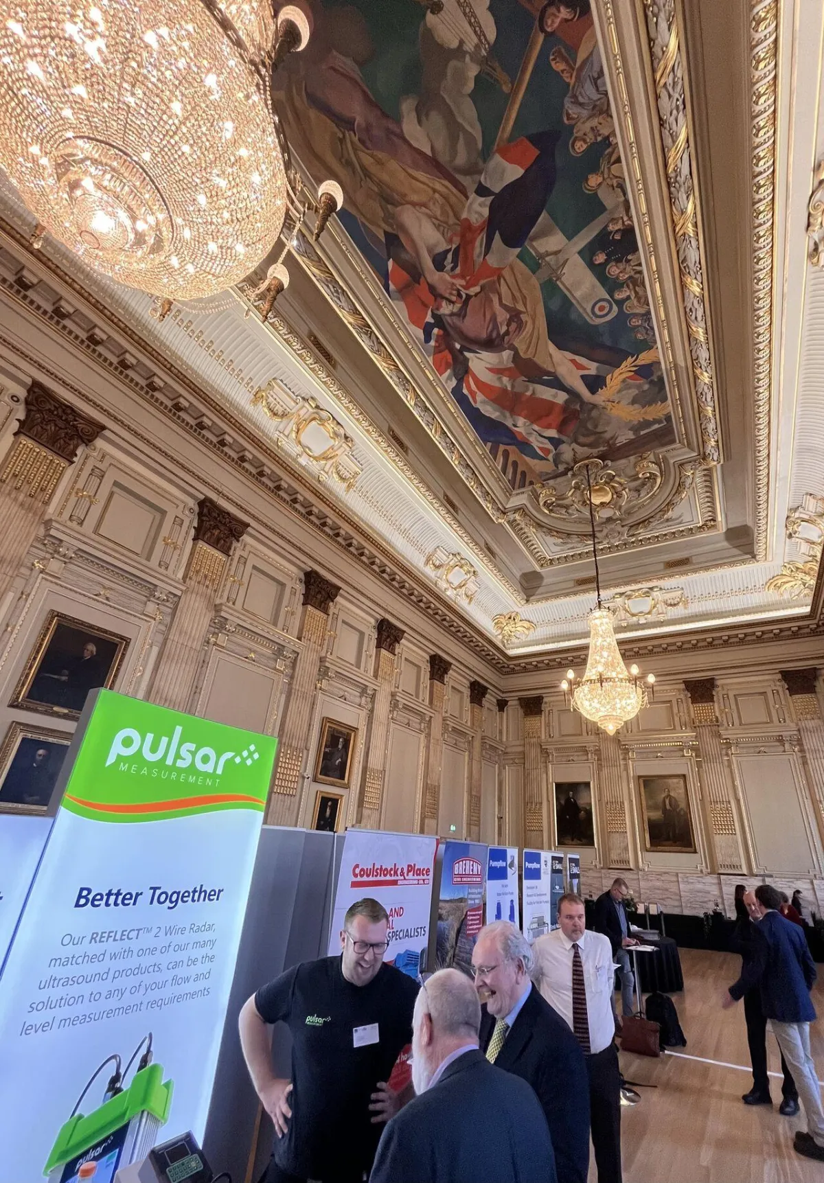 Pulsar Measurement’s booth at the Great Hall in Westminster, London, featuring the company logo.