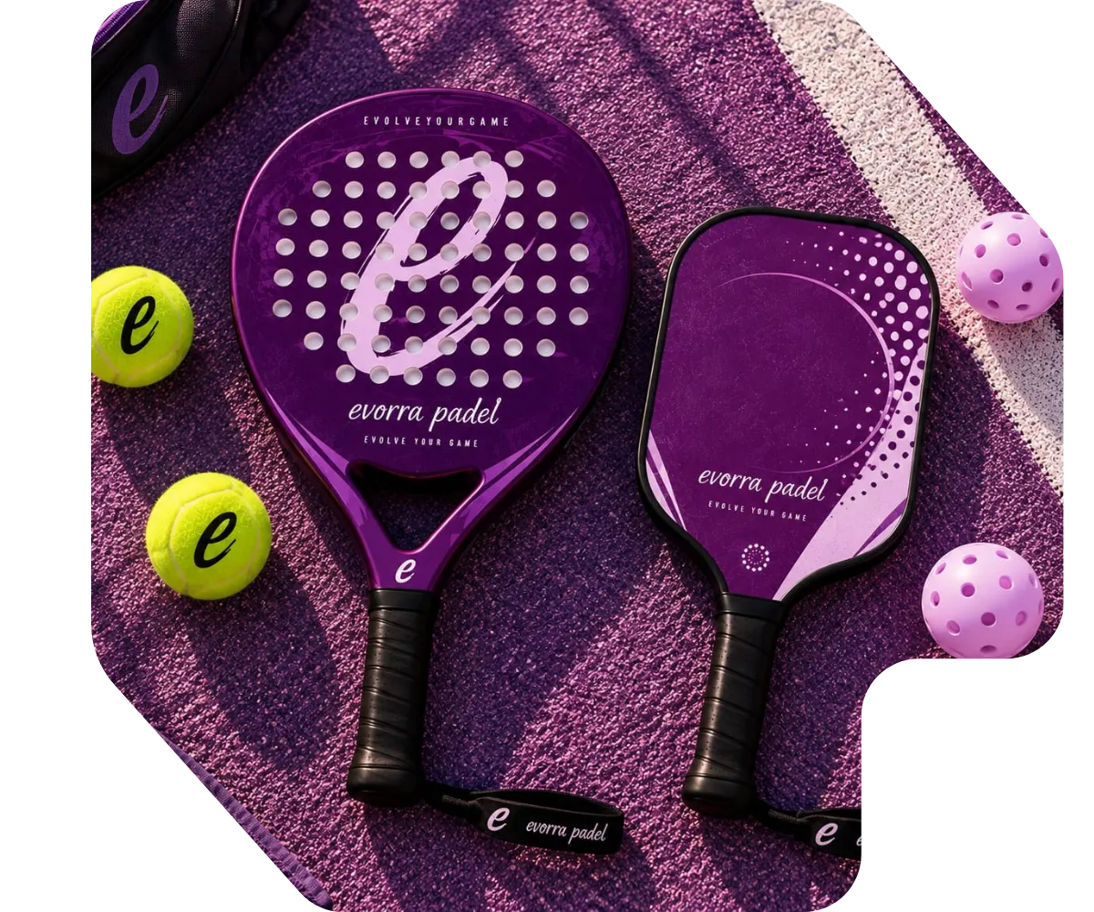 Two Evorra Padel branded padel rackets and balls