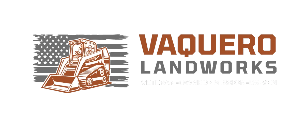 Vaquero Landworks logo featuring a skid steer loader in front of an American flag, with a cowboy silhouette in the cab and bold text reading ‘Vaquero Landworks.’ The black and white design emphasizes strength, patriotism, and professionalism.