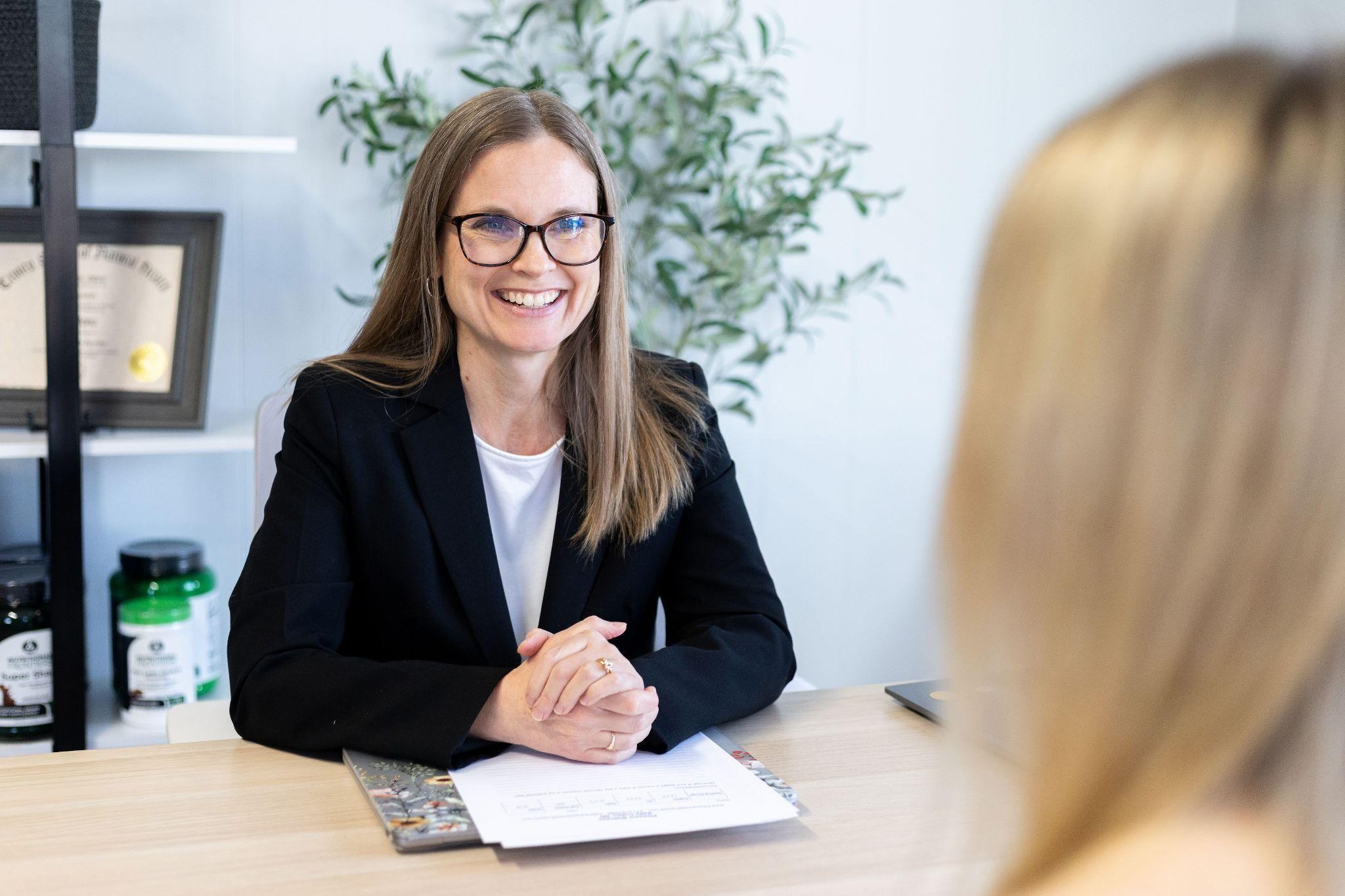 photograph of a woman in a clinical setting
